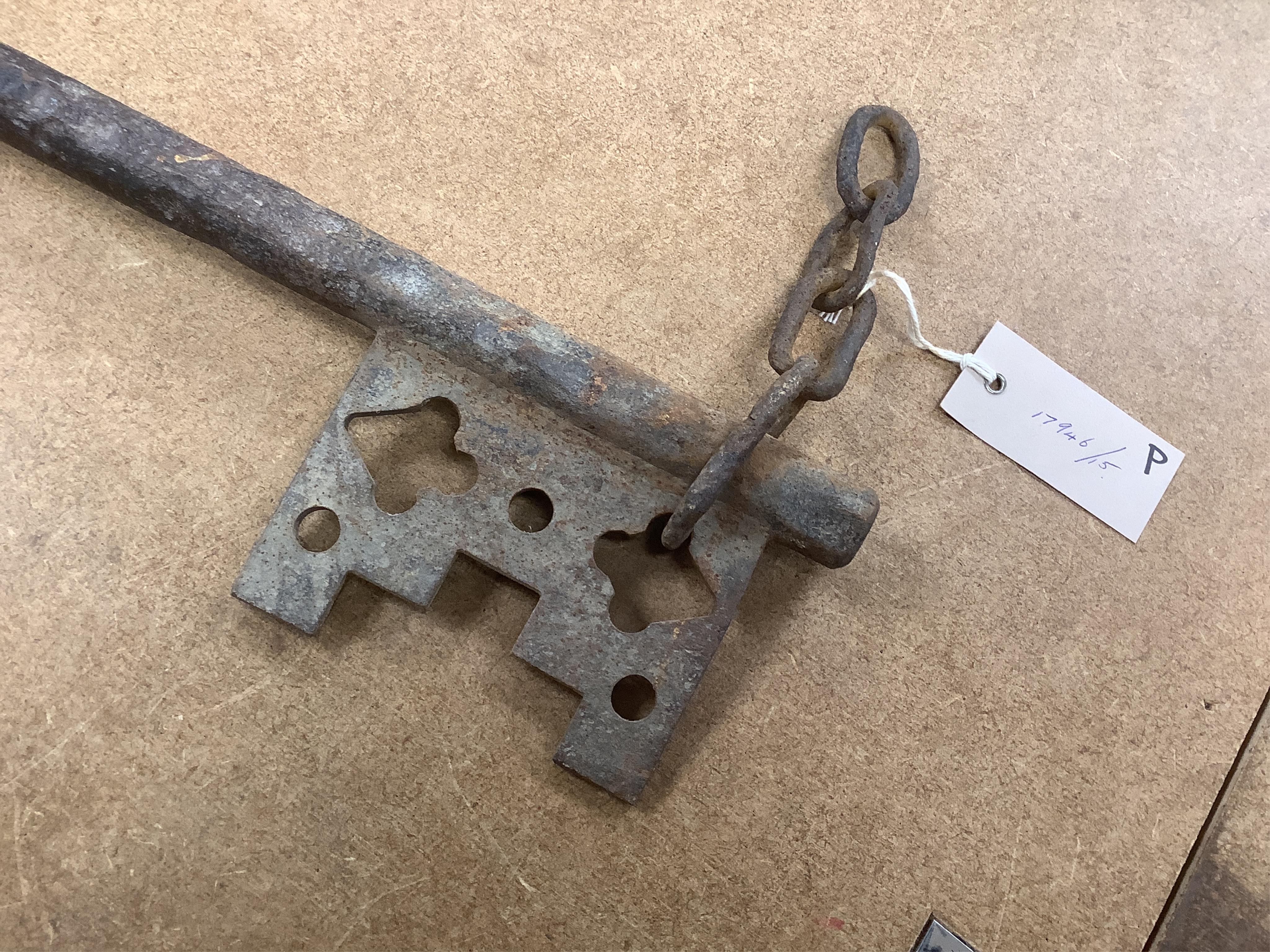 An oversized cast iron shop sign advertising key, 50cm wide. Condition - fair